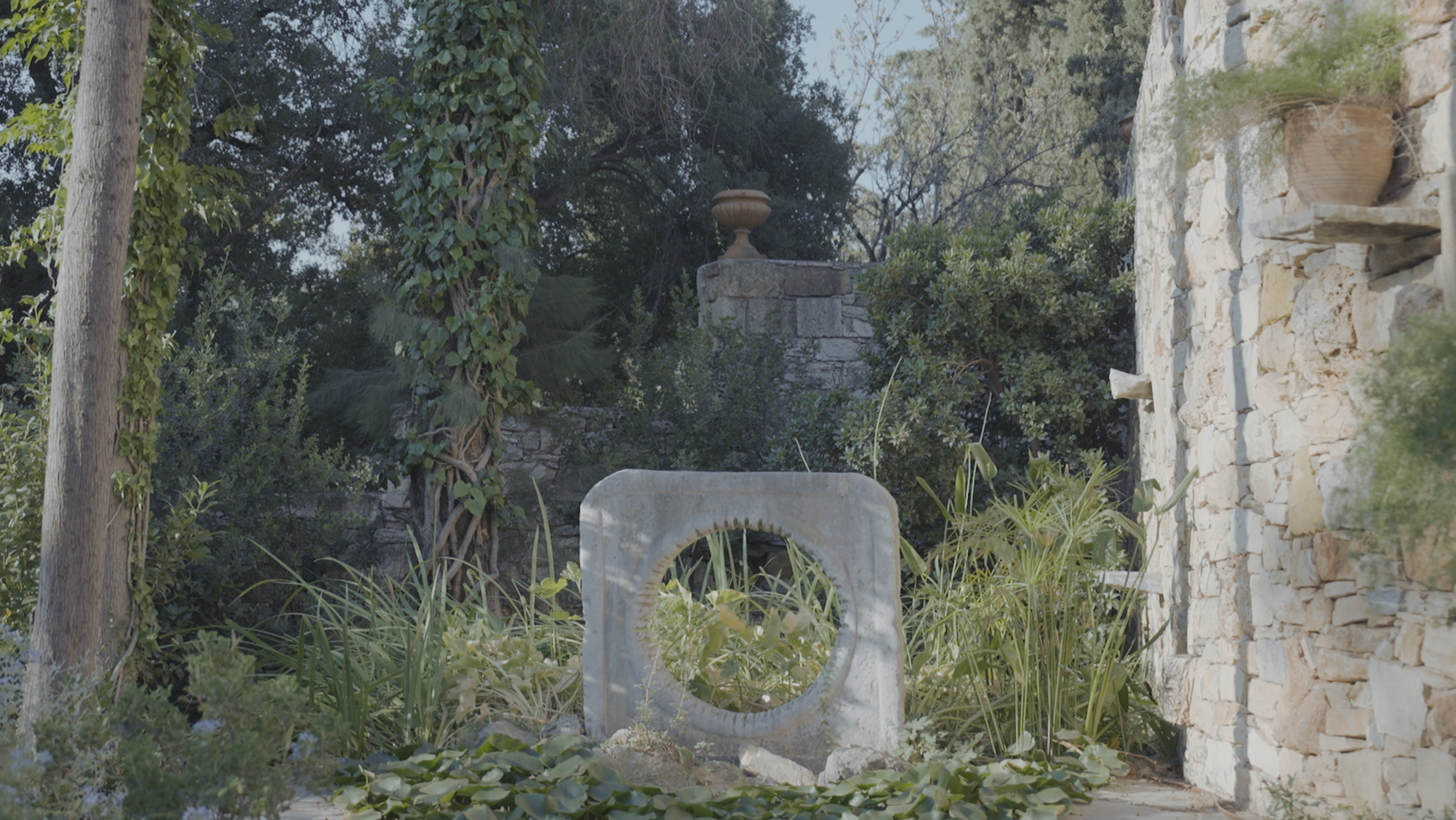 A photo of a stone sculpture in the garden of Vorres Museum